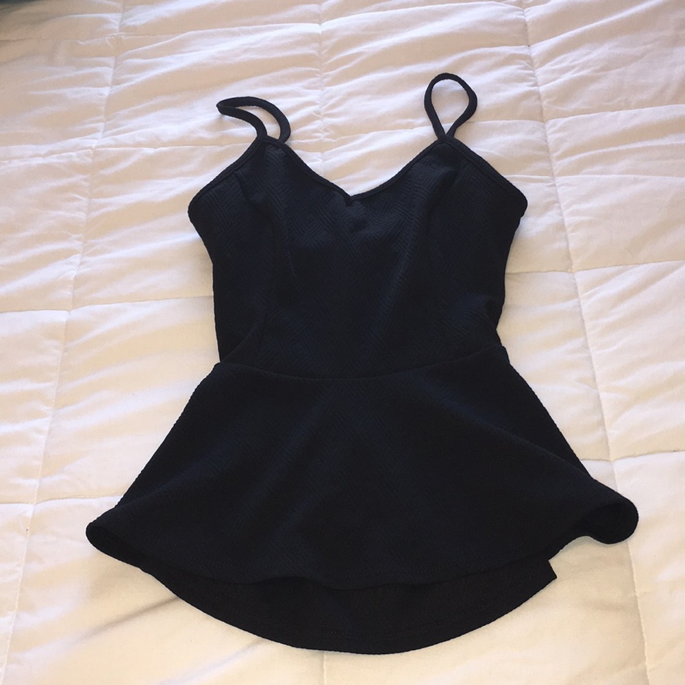 Peplum tank top with open back